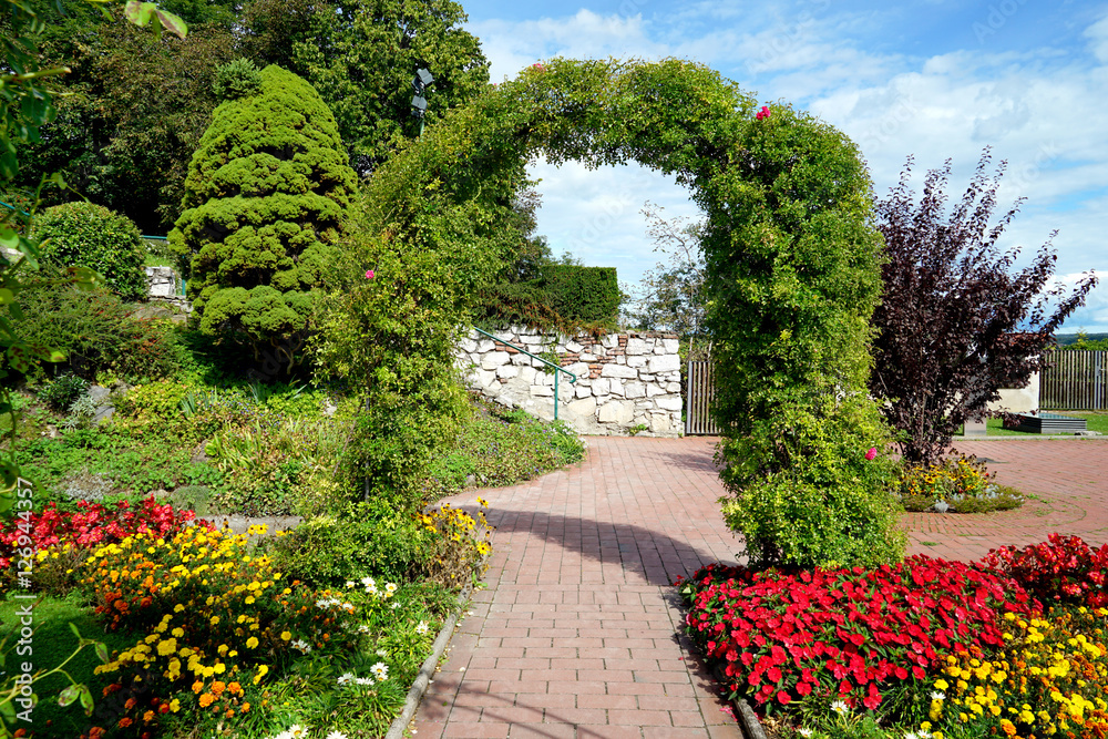 Floral arch in beautiful garden