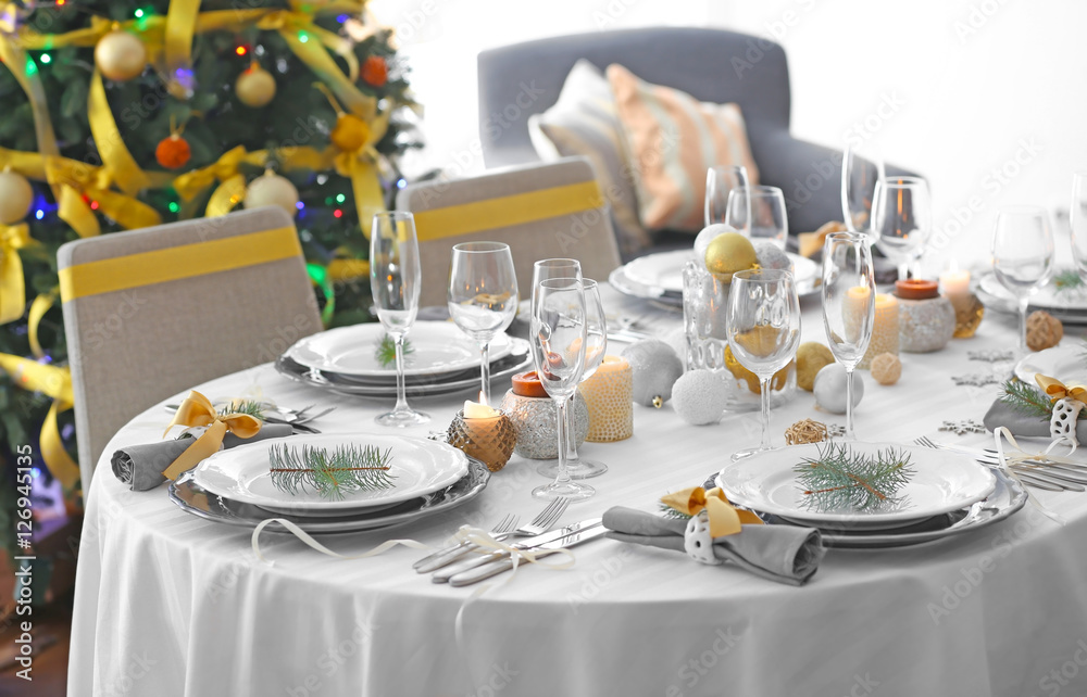 Fototapeta premium Table served for Christmas dinner in living room