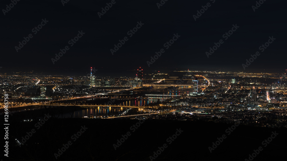 Fototapeta premium Vienna, aerial view at night with the river danube