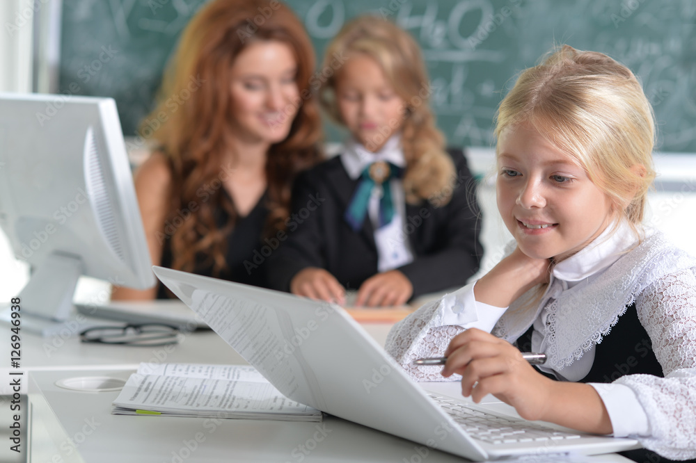 teacher with two girls at lesson teacher with two girls at lesson