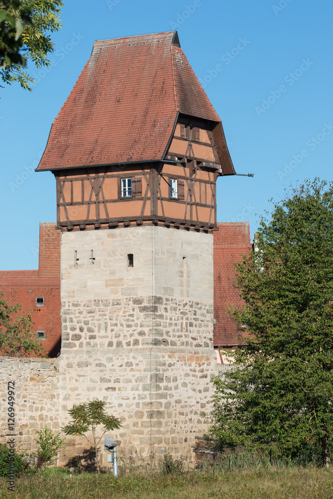 Restored watchtower with half-timbered construction integrated in the city wall of Dinkelsbuhl, along the Romantic Road Restored watchtower with half-timbered construction integrated in the city wall of Dinkelsbuhl, along the Romantic Road