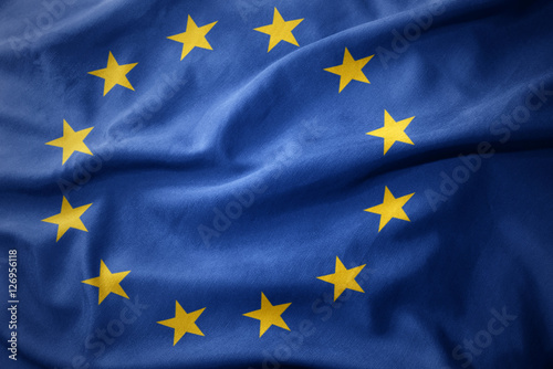 waving colorful flag of european union.