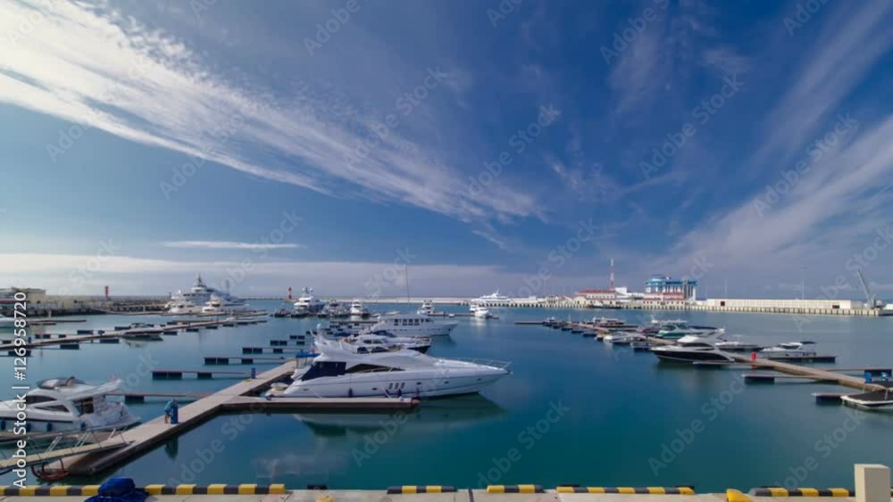 The city's waterfront, yacht in the sea port of Sochi timelapse hyperlapse The city's waterfront, yacht in the sea port of Sochi timelapse hyperlapse