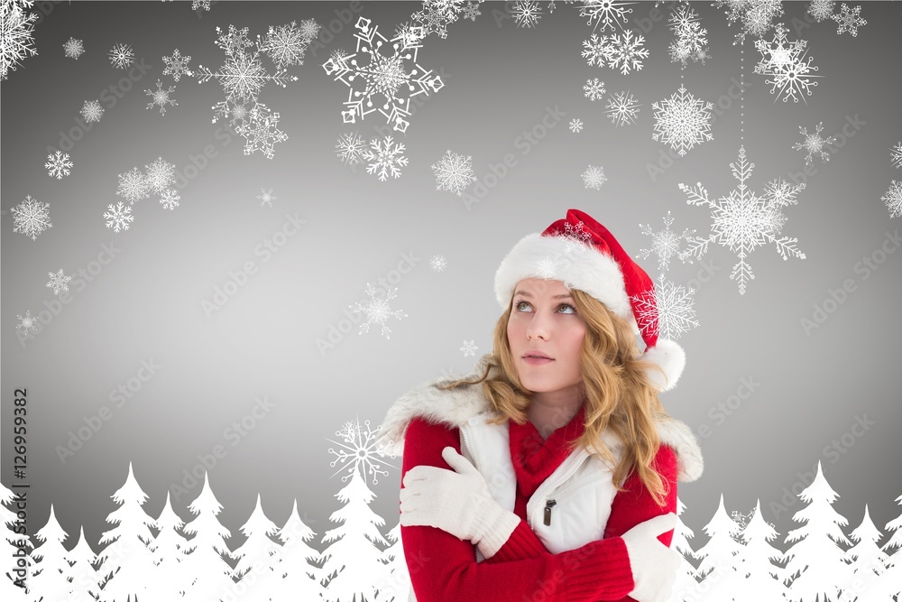 Woman in santa costume shivering with cold Woman in santa costume shivering with cold