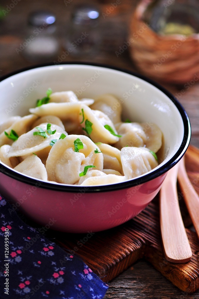 Homemade dumplings with beef, onion and parsley. Rustic style. Homemade dumplings with beef, onion and parsley. Rustic style.