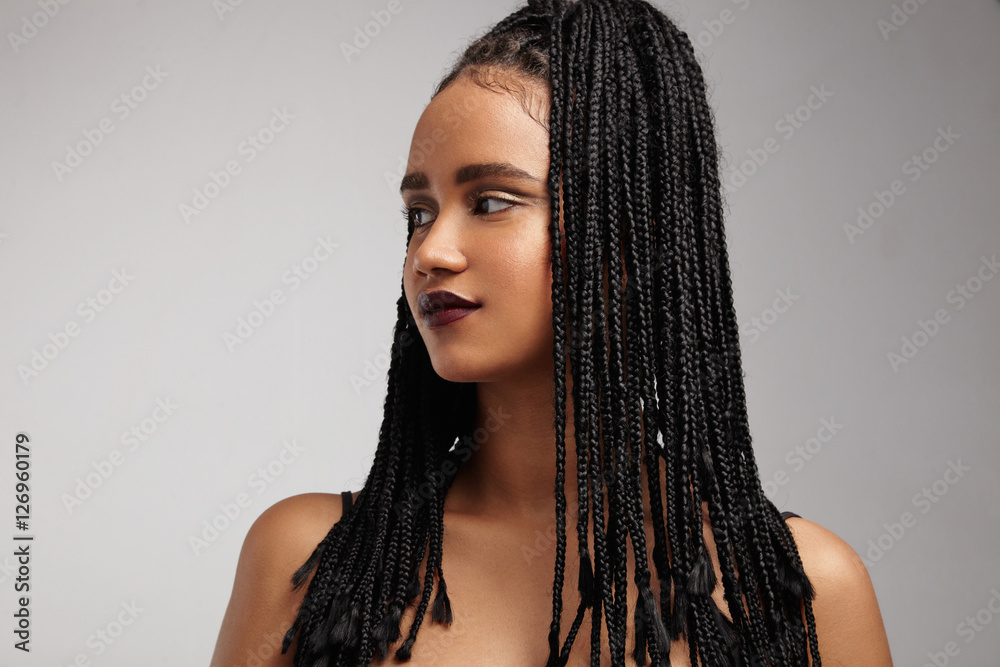 black woman's profile. African braids. false hair concept - obrazy, fototapety, plakaty 