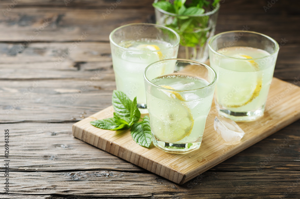 Fresh cocktail with soda and lemon Fresh cocktail with soda and lemon