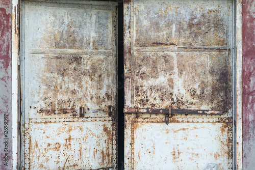 old warehouse doors, rusty metal background