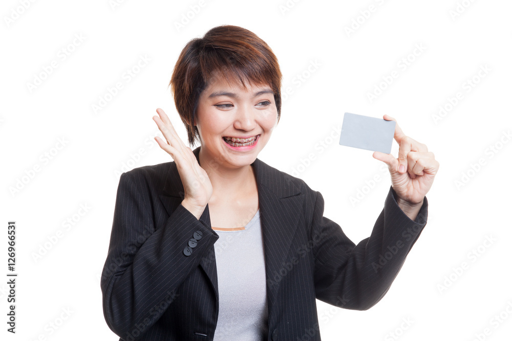 Young Asian business woman happy with blank card. Young Asian business woman happy with blank card.
