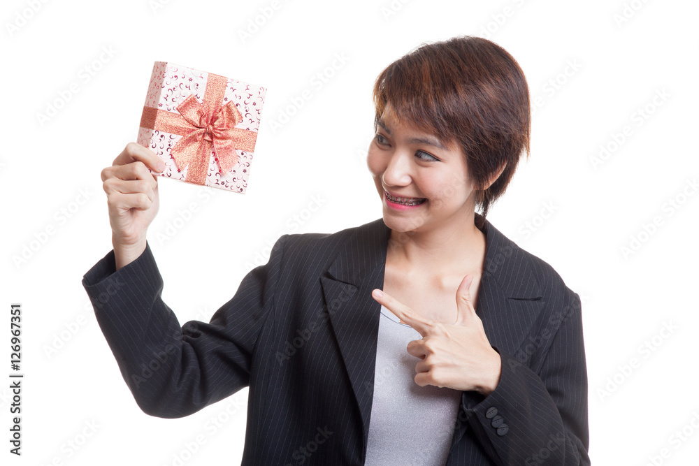 Young Asian business woman with a gift box. Young Asian business woman with a gift box.