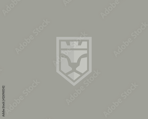 Lion face vector logotype. Luxury logo design. Crown king negative space symbol
