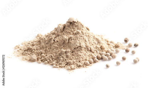 White pepper grain and powder isolated on white background