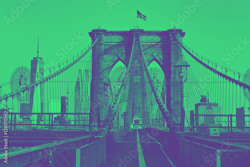 Brooklyn Bridge with flag on top. Duotone style. photo