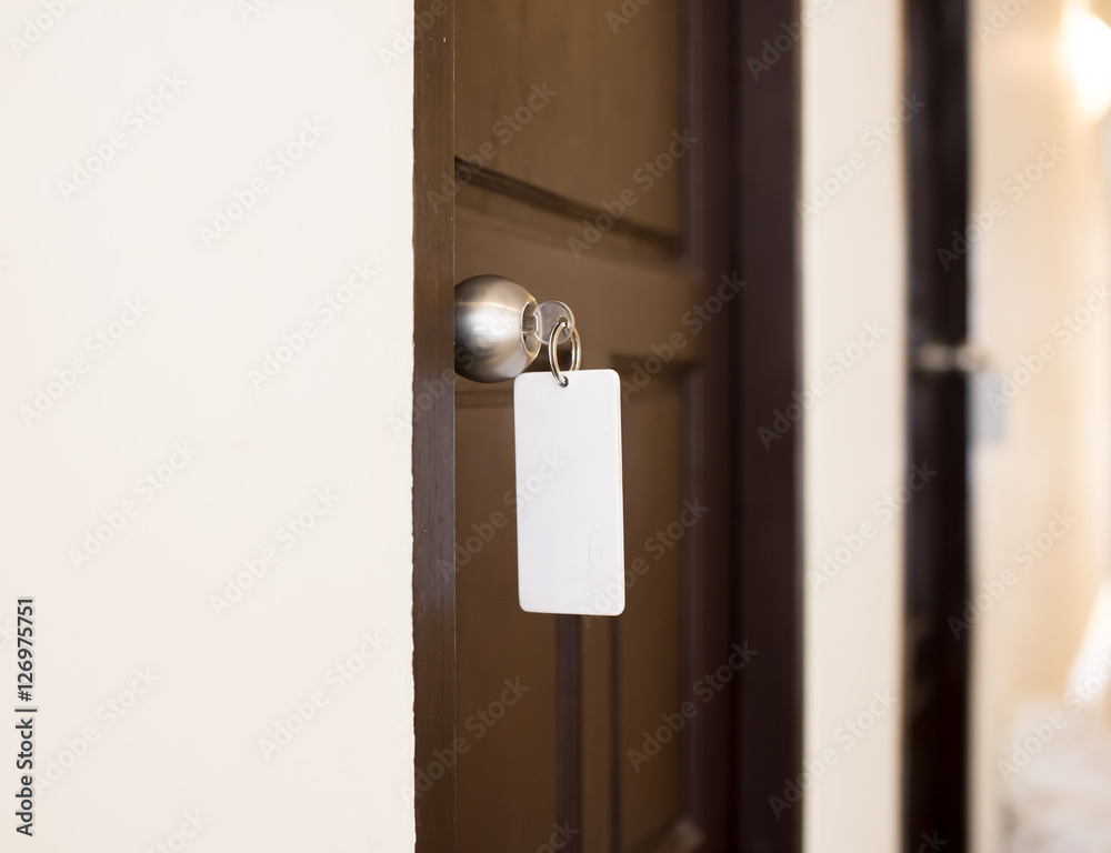 house key with hotel card and hotel door house key with hotel card and hotel door