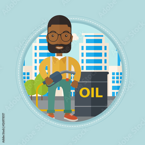 Man with oil barrel and gas pump nozzle.