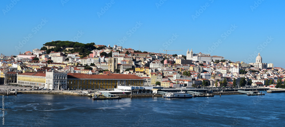 Panoramic view of port of Lisbon with old city and historical buildings.
Skyline of Alfama - the old district of Lisbon, Portugal.