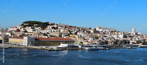 Panoramic view of port of Lisbon with old city and historical buildings. Skyline of Alfama - the old district of Lisbon, Portugal.
