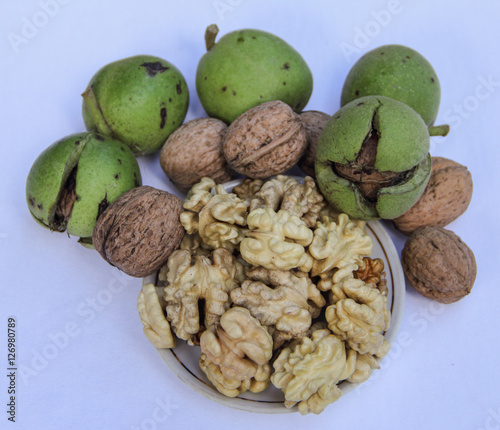 Different walnuts on white macro close up view.