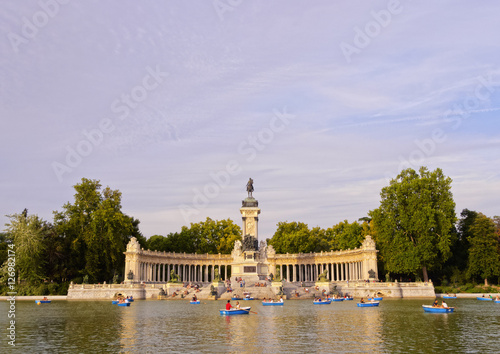 Spain, Madrid, View of the Alfonso XII Monument and Lake in Parque del Retiro.