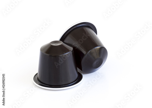 Italian coffee espresso capsules or coffee pods on white isolate