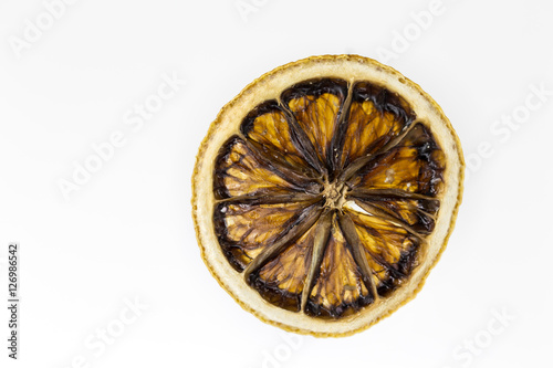 dried lemon isolated on white background