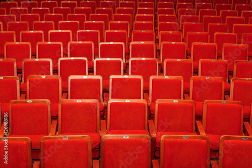 red chairs for the audience in the cinema or theater