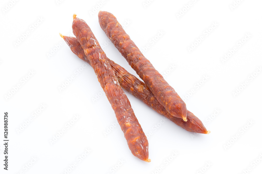Smoked sausage salami isolated on a white background. Smoked sausage salami isolated on a white background.