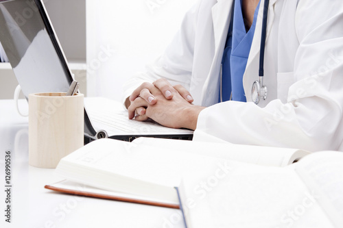 doctor with laptop in the office
