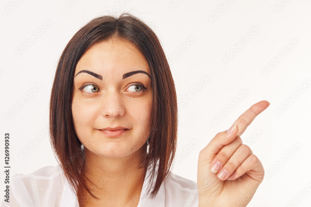Having an idea woman pointing finger to the side Having an idea woman pointing finger to the side