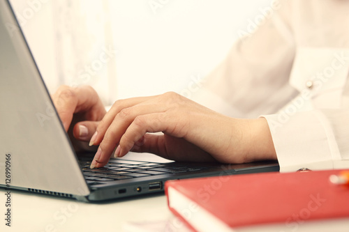 woman hands and laptop