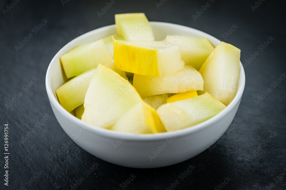 Honeydew Melon on a slate slab (selective focus) Honeydew Melon on a slate slab (selective focus)