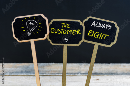 Concept message THE CUSTOMER IS ALWAYS RIGHT and light bulb as symbol for idea