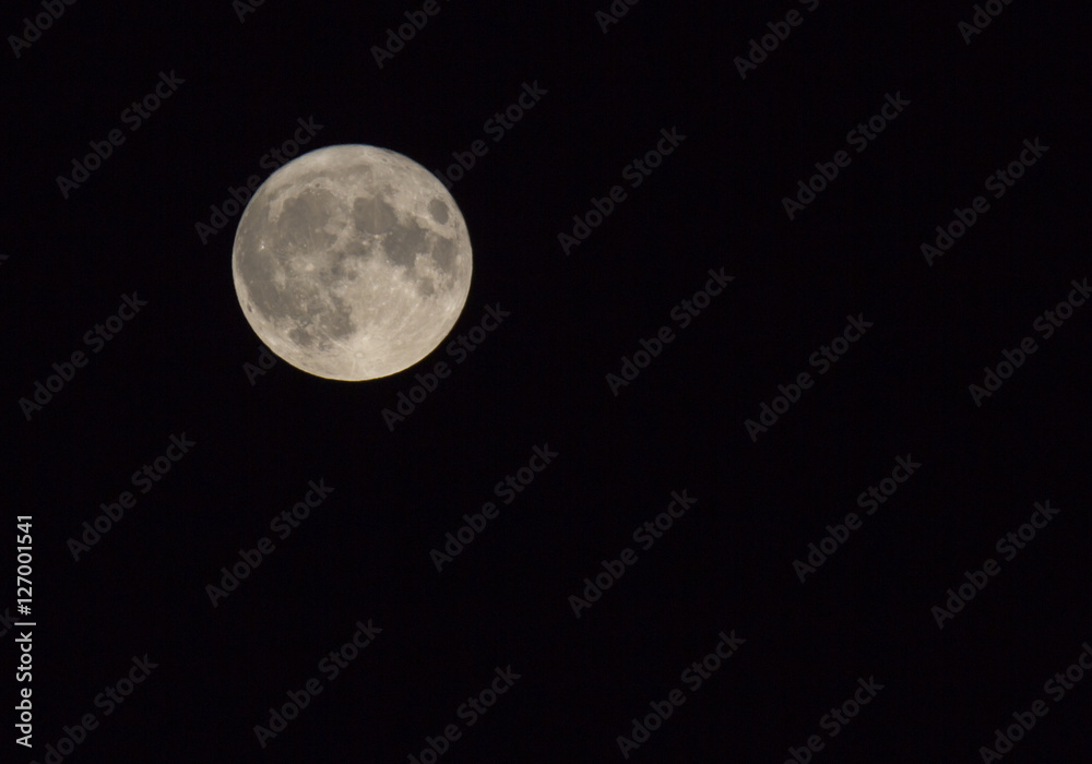 Super moon on a black sky. The moon is composed to the left hand side. Super moon on a black sky. The moon is composed to the left hand side.