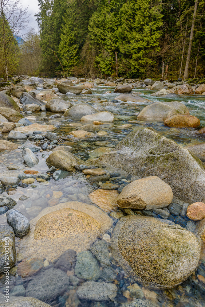 Beautiful Mountain River at the Riverside Park. North Vancouver, British Columbia, Canada. Beautiful Mountain River at the Riverside Park. North Vancouver, British Columbia, Canada.
