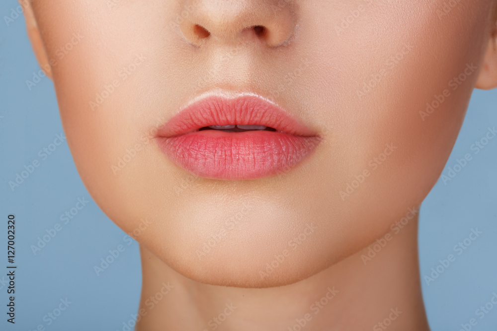 Perfect natural lip makeup. Close up macro photo with beautiful female mouth. Plump full lips. Close-up face detail. Perfect clean skin, light fresh lip make-up. Beautiful spa tender lip Perfect natural lip makeup. Close up macro photo with beautiful female mouth. Plump full lips. Close-up face detail. Perfect clean skin, light fresh lip make-up. Beautiful spa tender lip