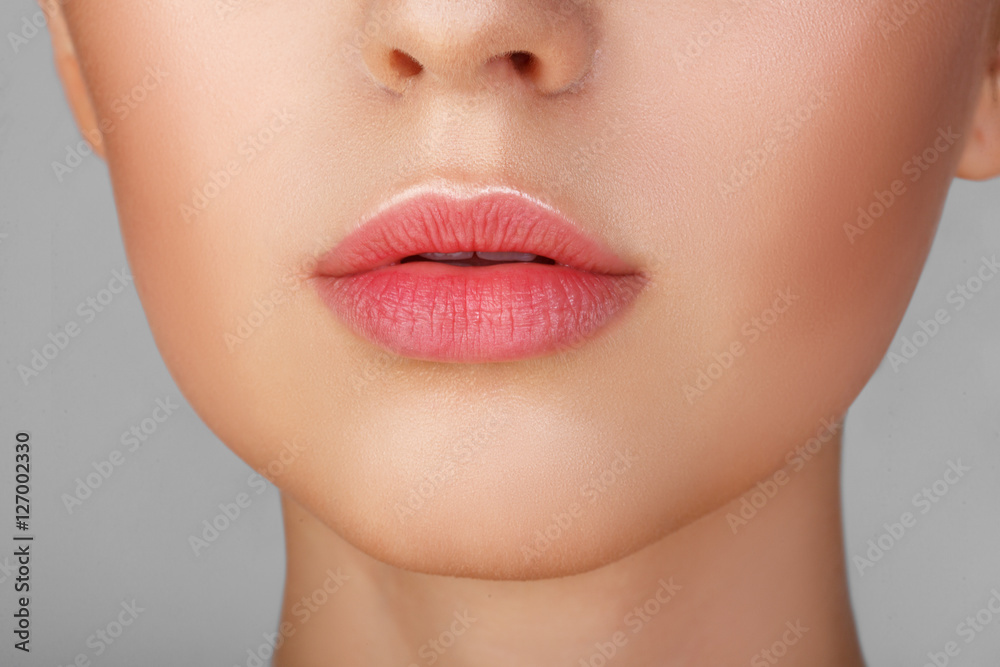 Perfect natural lip makeup. Close up macro photo with beautiful female mouth. Plump full lips. Close-up face detail. Perfect clean skin, light fresh lip make-up. Beautiful spa tender lip Perfect natural lip makeup. Close up macro photo with beautiful female mouth. Plump full lips. Close-up face detail. Perfect clean skin, light fresh lip make-up. Beautiful spa tender lip