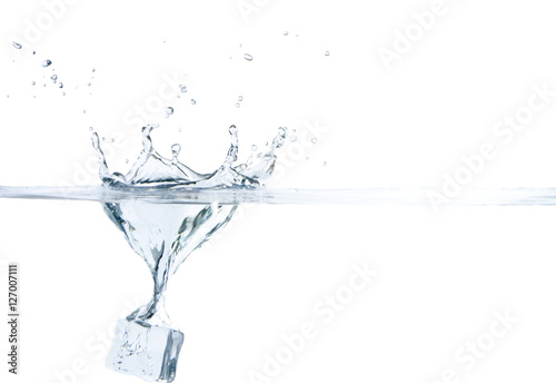 Slika na platnu Ice Splashing into Water