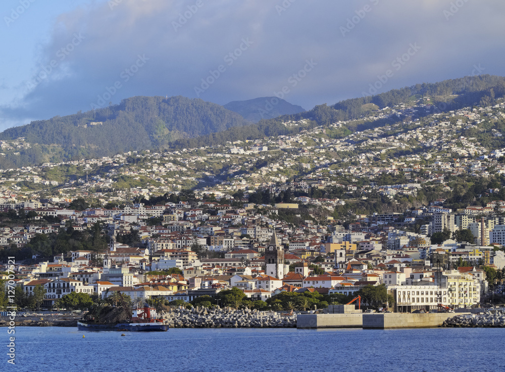 Portugal, Madeira, Funchal, Cityscape viewed from the ferry leaving the port.. Portugal, Madeira, Funchal, Cityscape viewed from the ferry leaving the port..