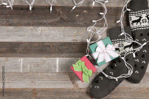 Knitted socks and Christmas gifts with Christmas ligh