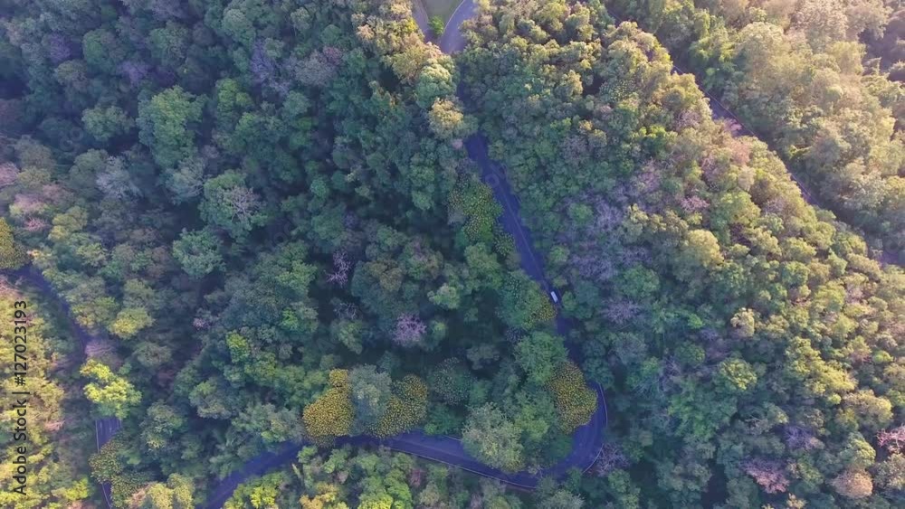 Aerial Views Flight over the Mountains. Flying over the River. Forest Valley. Morning Fog. The road up the hill. Doi Suthep Chiangmai Thailand. Aerial Views Flight over the Mountains. Flying over the River. Forest Valley. Morning Fog. The road up the hill. Doi Suthep Chiangmai Thailand.
