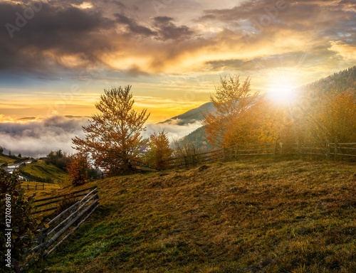 foggy and hot sunset in Carpathian mountains