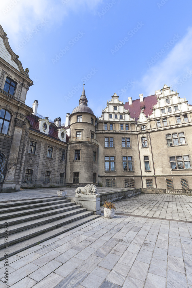 View on 17 th century Moszna Castle on a sunny day, Poland View on 17 th century Moszna Castle on a sunny day, Poland