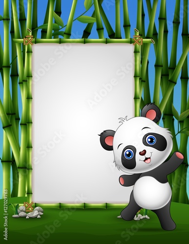 Fototapeta Naklejka Na Ścianę i Meble -  Cartoon panda standing on a bamboo frame 
