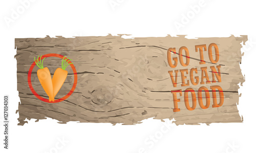 Wooden banner with the words go to vegan food