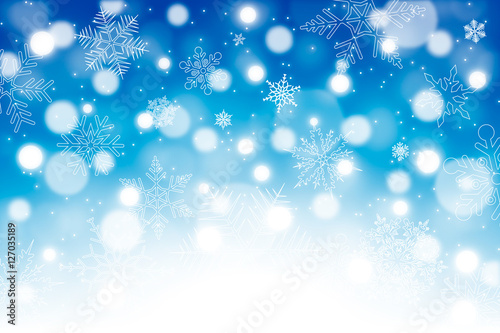 Christmas background with snowflakes and bokeh