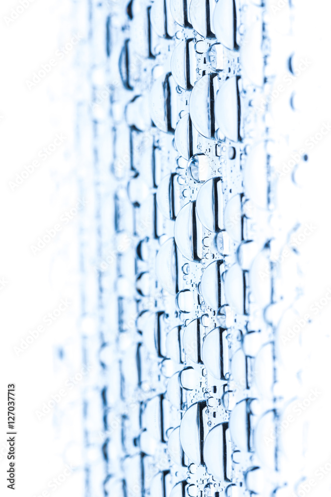 Blue water drops of on treat water-repellent surface in macro lens shot small-DOF for screen wallpapers Blue water drops of on treat water-repellent surface in macro lens shot small-DOF for screen wallpapers