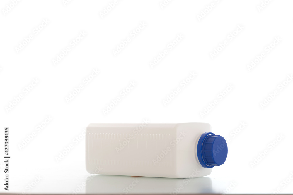 Four blank plastic containers for medicine on white background Four blank plastic containers for medicine on white background