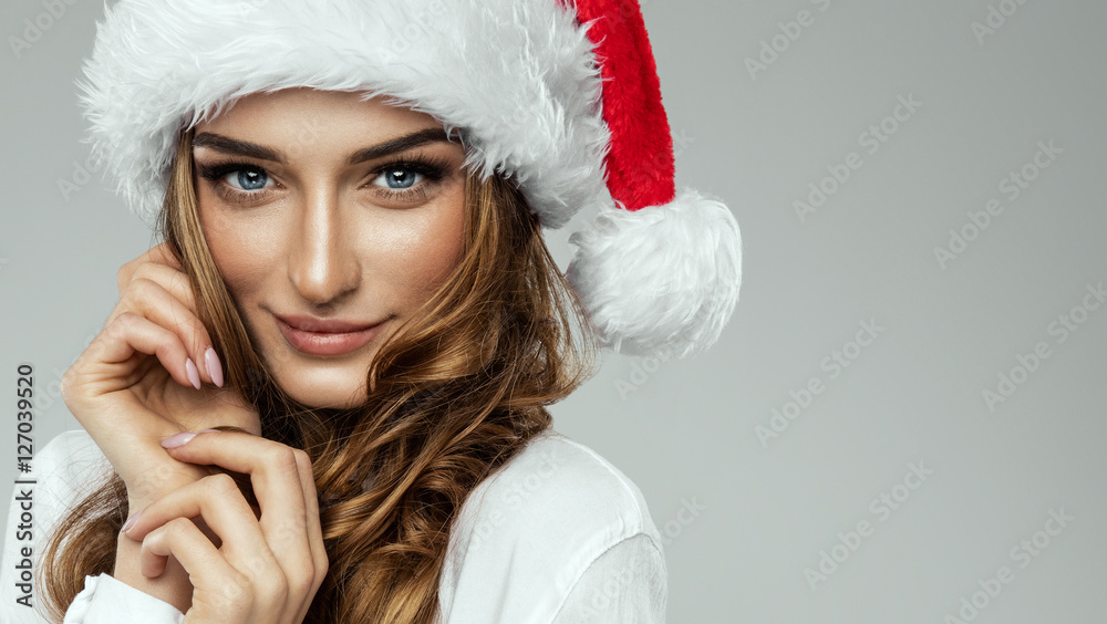 Portrait of beautiful female model wear santa hat - obrazy, fototapety, plakaty 