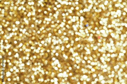 Christmas background and golden abstract glitter defocused backg