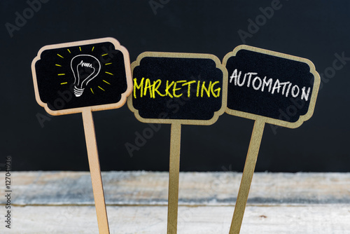 Concept message MARKETING AUTOMATION and light bulb as symbol for idea